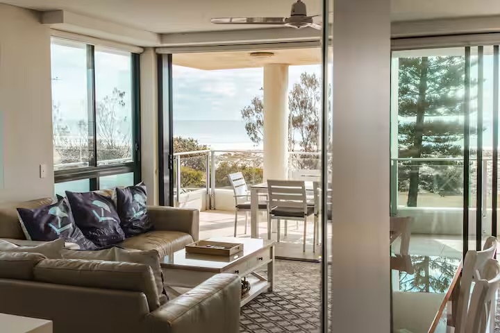 Living room and ocean outlook at Casa d' Mar, absolute beachfront at Kirra Beach, Coolangatta — photo 5 of 8
