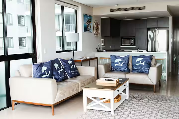 Living room and ocean outlook at Casa d' Mar, absolute beachfront at Kirra Beach, Coolangatta — photo 3 of 8