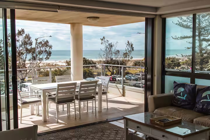 Living room and ocean outlook at Casa d' Mar, absolute beachfront at Kirra Beach, Coolangatta — photo 2 of 8