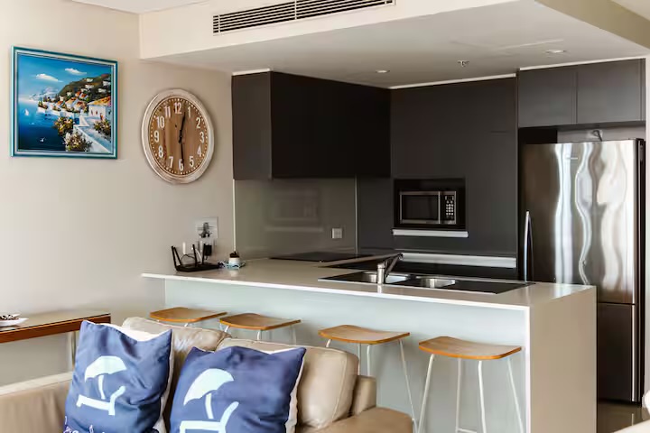 Living room and ocean outlook at Casa d' Mar, absolute beachfront at Kirra Beach, Coolangatta — photo 7 of 8